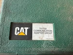 Caterpillar 7X1701 Communication Adapter Used. Price: $129.00.